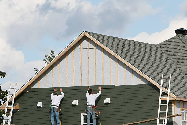 Professional Emergency Siding Repair technician working in Ravenna, OH